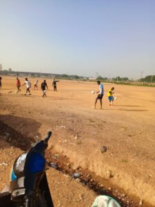 young footballers training on a field